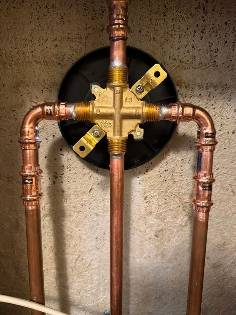 Copper shower valve rough-in installed by MRJ Plumbing in Asheville, NC