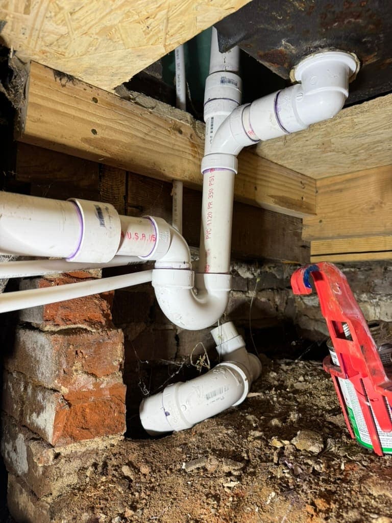 Plumbing in a crawlspace, where pipes are most exposed to freezing, near Asheville, NC