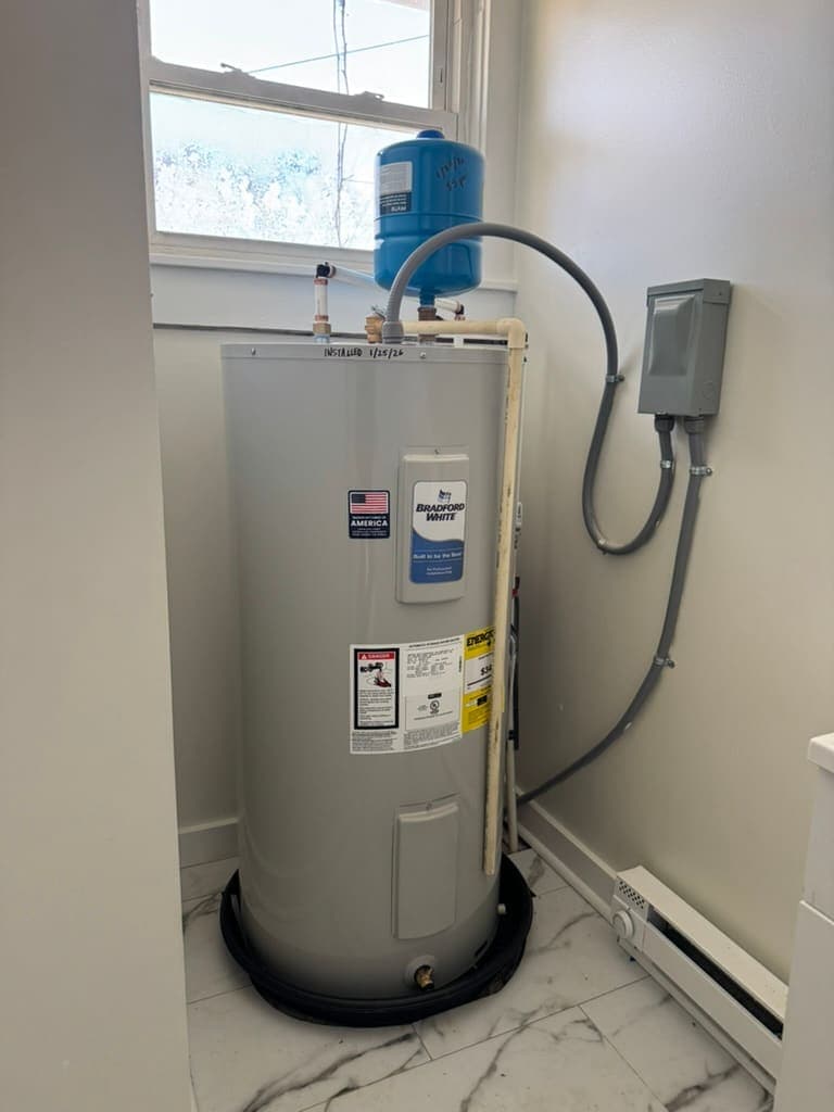 New tank water heater with expansion tank installed by MRJ Plumbing in Asheville, NC