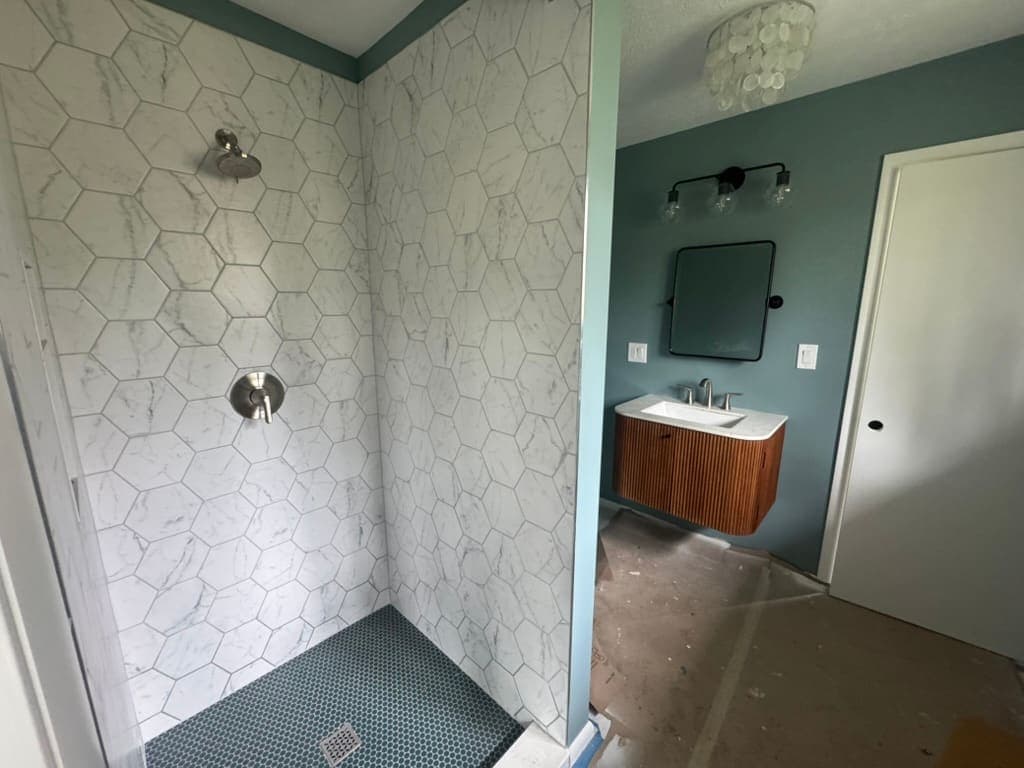 Bathroom vanity and toilet installed by MRJ Plumbing in Asheville, NC