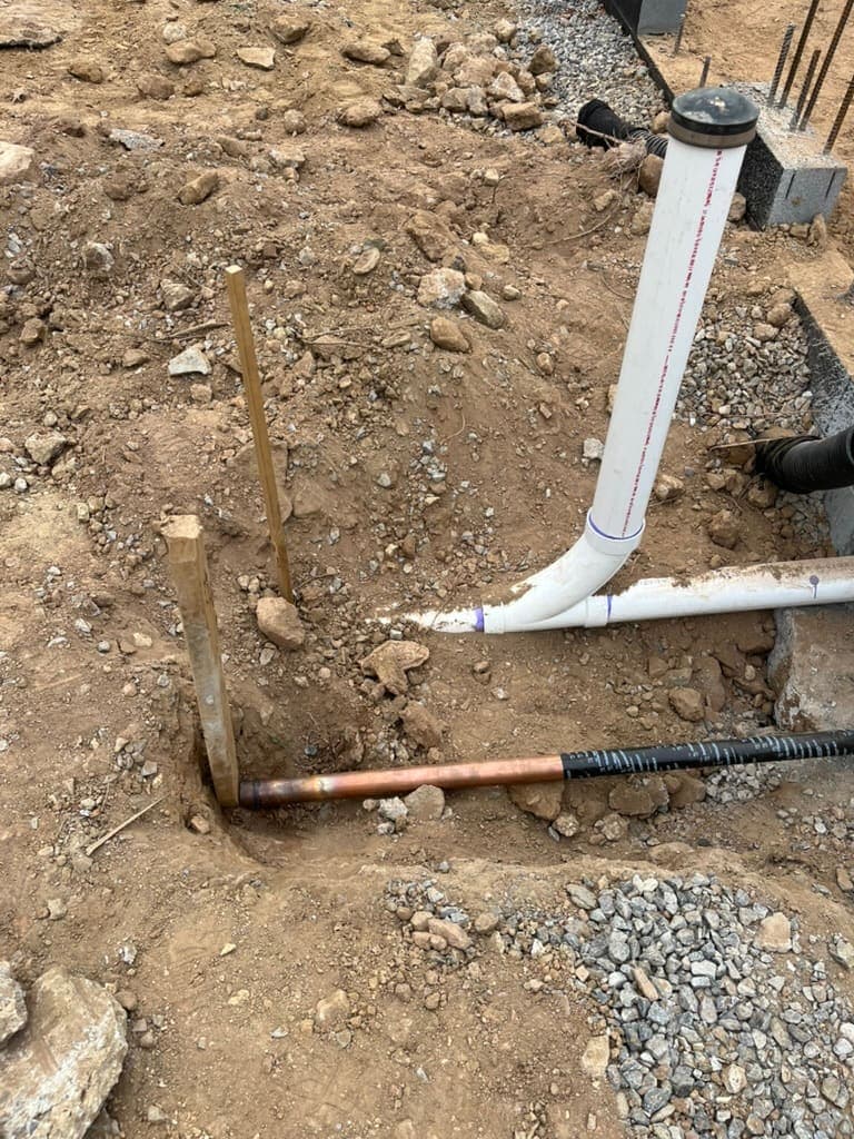 Copper water lines in steel framing, a plumbing job by MRJ Plumbing in the Asheville, NC area