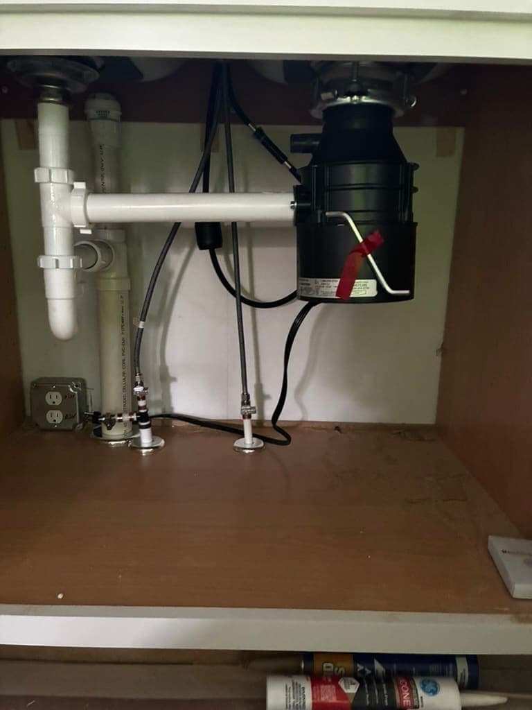 Garbage disposal and kitchen sink drain installed by MRJ Plumbing in Asheville, NC
