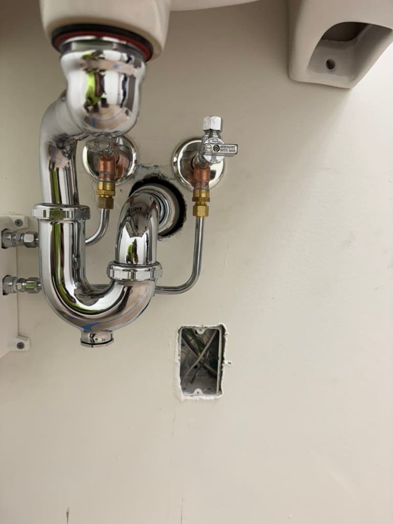 Chrome sink drain trap, a plumbing job by MRJ Plumbing in the Asheville, NC area