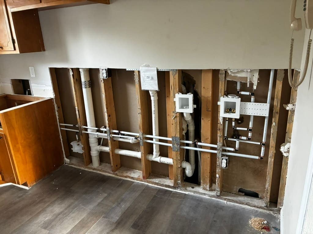 PEX supply lines in an open wall, a plumbing job by MRJ Plumbing in the Asheville, NC area