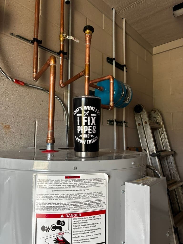 Electric water heater with copper connections, a plumbing job by MRJ Plumbing in the Asheville, NC area