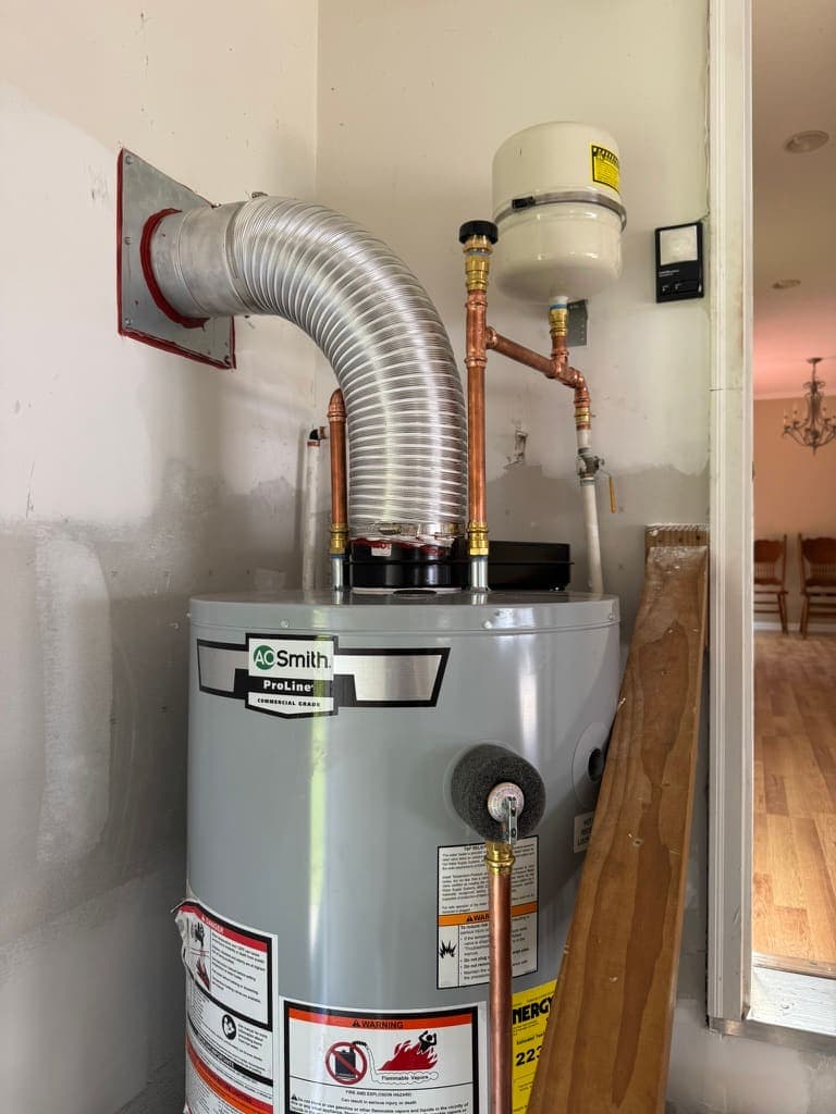 Gas water heater with new venting, a plumbing job by MRJ Plumbing in the Asheville, NC area