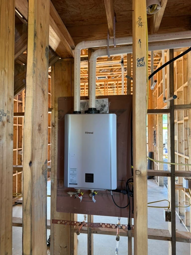 Tankless water heater installed during new construction, a plumbing job by MRJ Plumbing in the Asheville, NC area