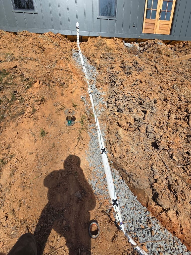 Water line trench, a plumbing job by MRJ Plumbing in the Asheville, NC area
